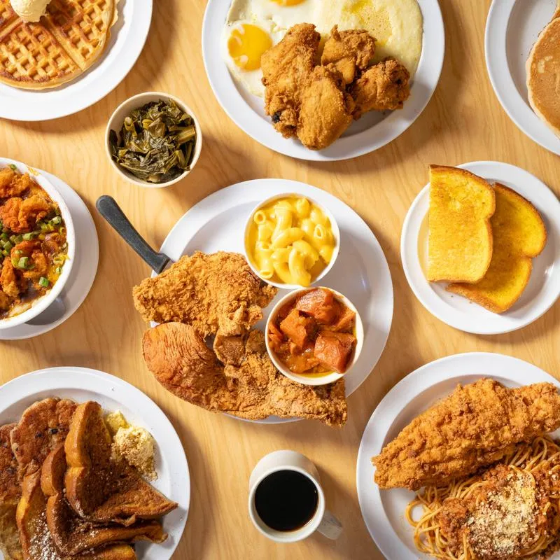 A table covered with plates of soul food